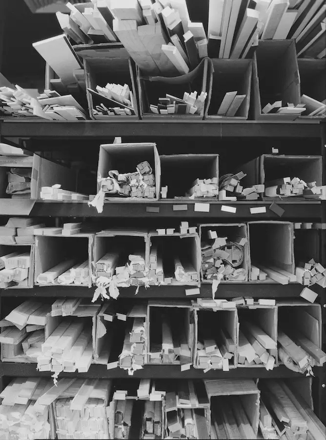 Shelves stacked with hand-selected frame moulding stock